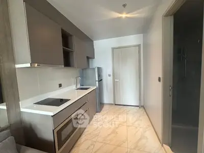 Modern kitchen with sleek cabinetry and stainless steel appliances