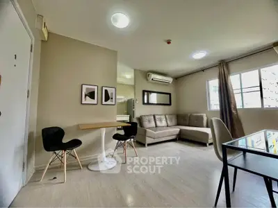 Modern living room with stylish furniture and natural light