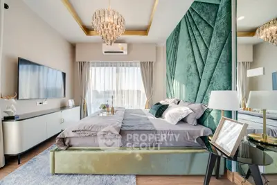 Luxurious bedroom with elegant decor and large window offering natural light.