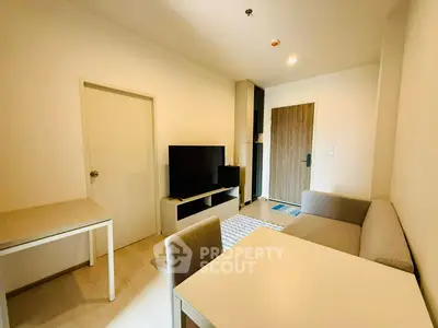 Modern living room with cozy sofa and flat-screen TV in a stylish apartment