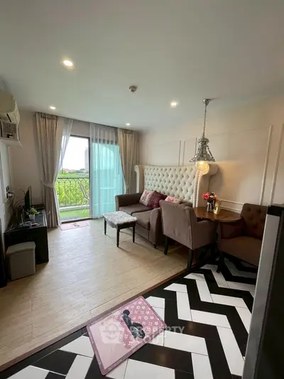 Chic living room with elegant decor and balcony view