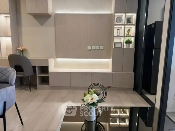 Modern living room with stylish furniture and built-in shelving, perfect for contemporary living.