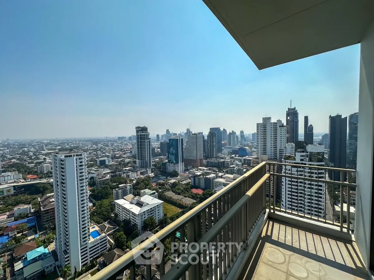 Stunning cityscape view from a high-rise balcony, perfect for urban living enthusiasts.