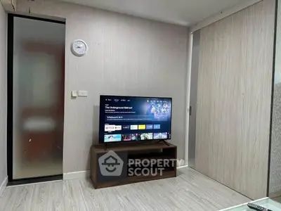 Modern living room with sleek TV setup and minimalist decor