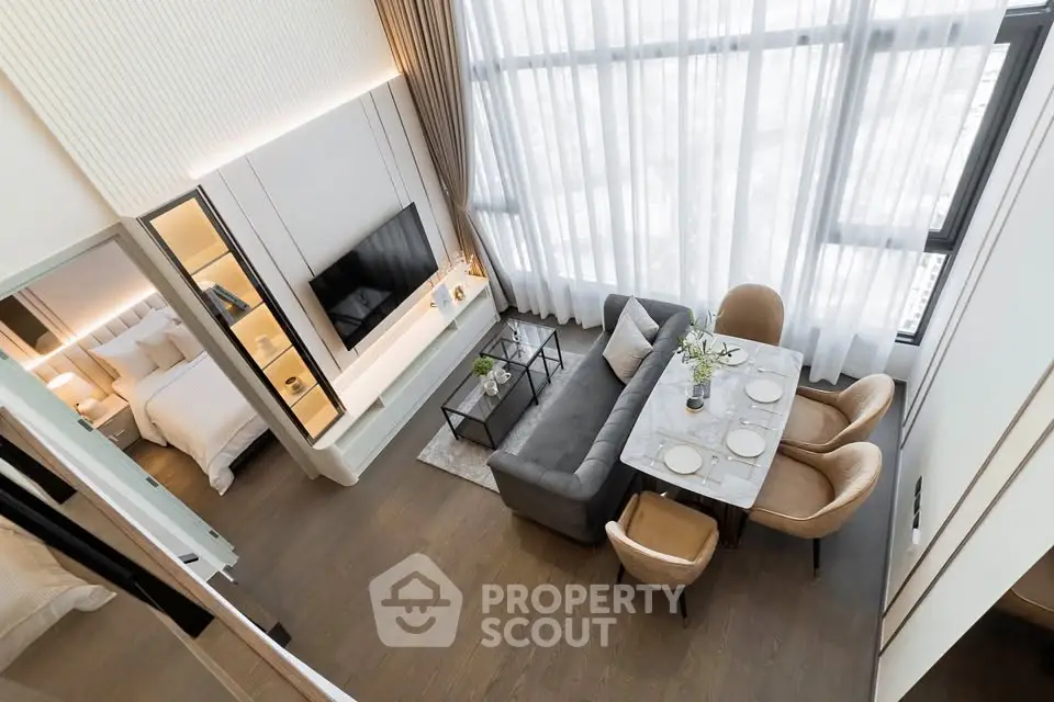 Luxurious modern living room with high ceilings and elegant dining area