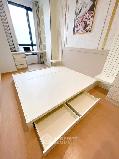 Modern bedroom with built-in storage and elegant decor