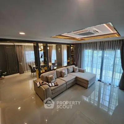 Luxurious living room with elegant decor and spacious seating area