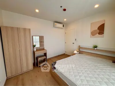 Modern bedroom with wooden furniture and natural light