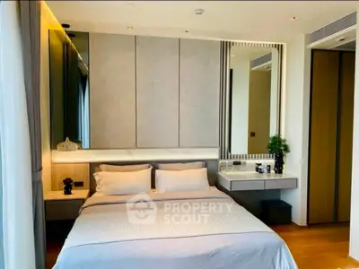 Luxurious modern bedroom with elegant decor and ample natural light.