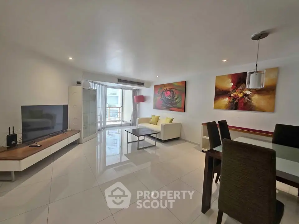 Spacious modern living room with elegant decor and natural light