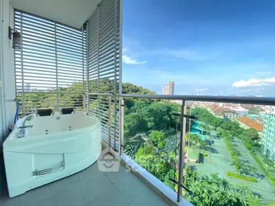 Luxurious balcony with jacuzzi and stunning city view