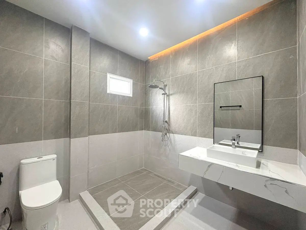 Spacious modern bathroom with sleek design and elegant fixtures