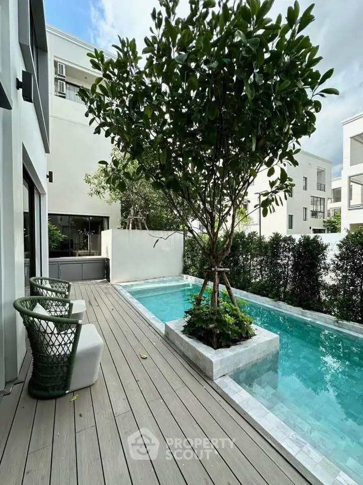 Luxurious modern home with private pool and stylish deck, perfect for relaxation and entertaining.