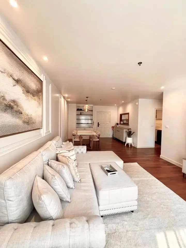 Spacious living room with elegant decor and cozy seating area