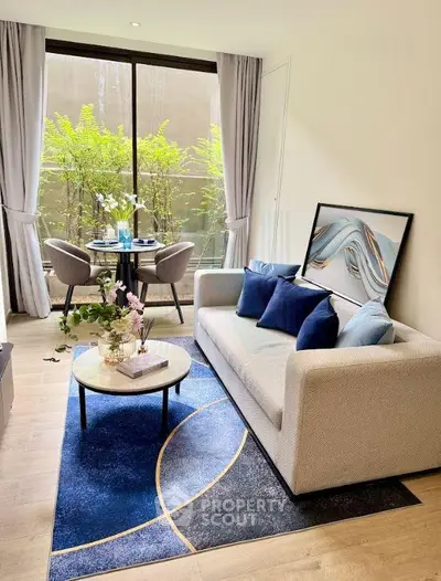 Stylish living room with modern decor and large window view
