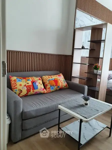 Modern living room with stylish decor and cozy sofa