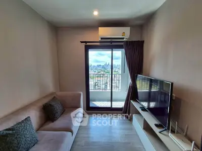 Modern living room with city view and balcony access