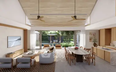 Luxurious open-plan living room with garden view, featuring modern furniture and elegant decor.