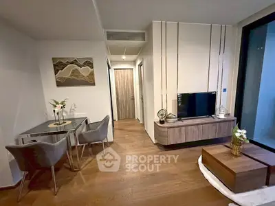 Modern living room with stylish decor and wooden flooring