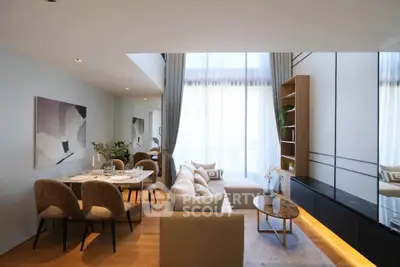 Modern living room with elegant decor and natural light