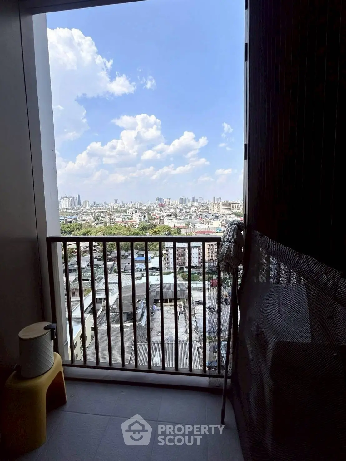 Stunning cityscape view from a high-rise balcony, perfect for urban living enthusiasts.