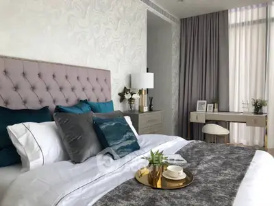 Luxurious bedroom with elegant decor and natural light