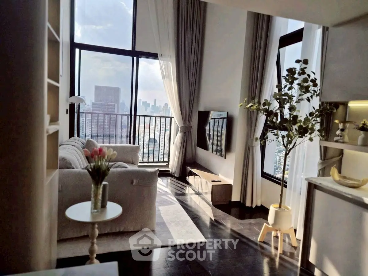 Luxurious high-rise living room with stunning city view and elegant decor