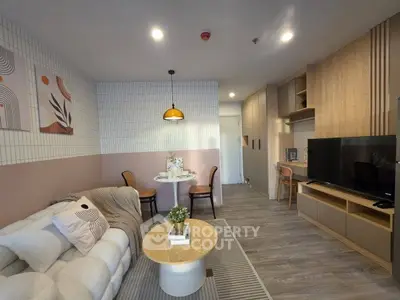 Modern living room with stylish decor and cozy seating area, perfect for relaxation and entertainment.