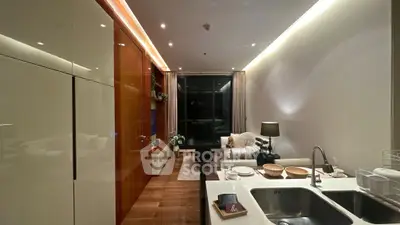 Modern living room with open kitchen, sleek design, and cozy ambiance