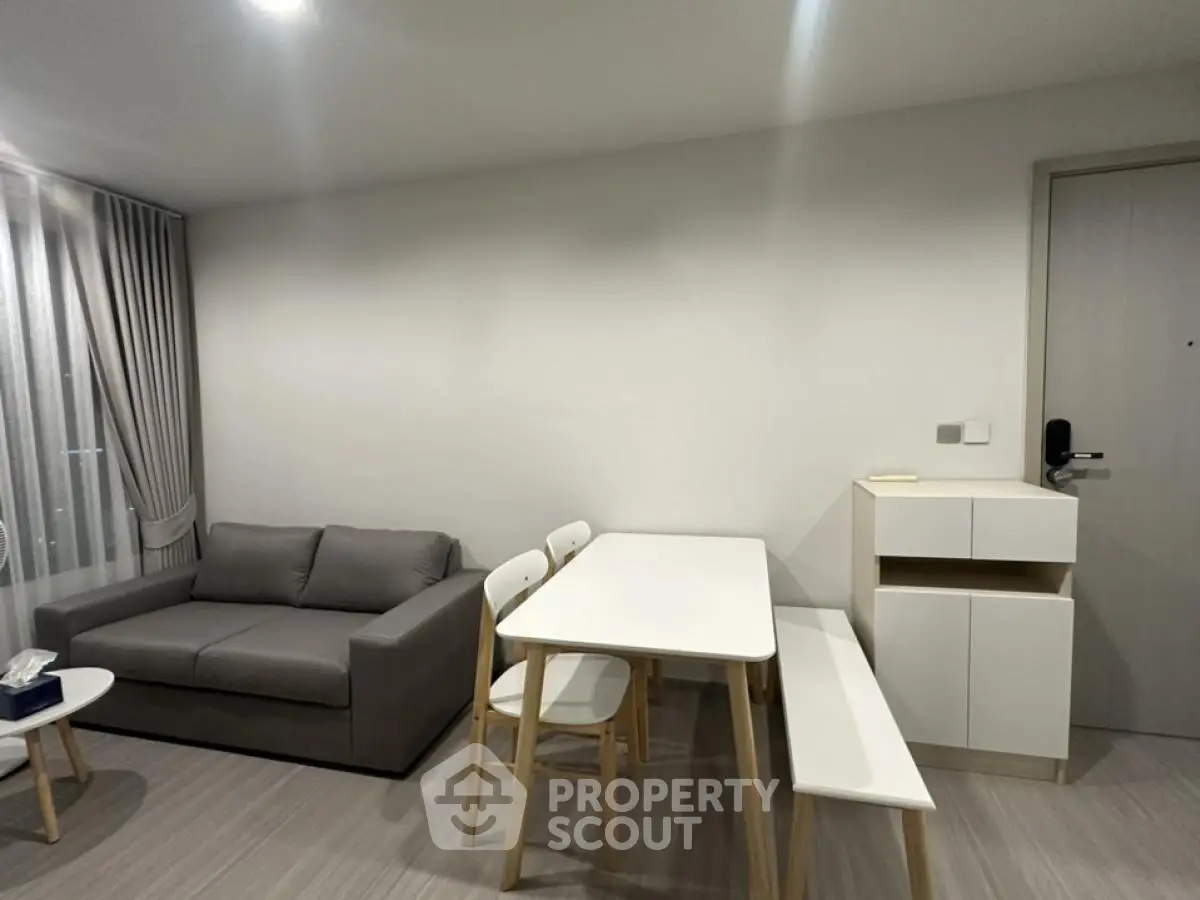 Modern living room with sleek furniture and minimalist design