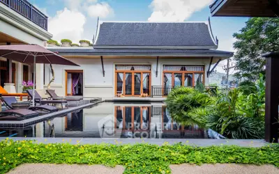 Luxurious villa with private pool and lush garden, perfect for serene living.