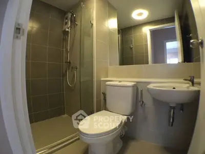 Modern bathroom with sleek design and glass shower enclosure