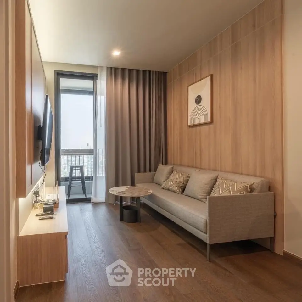 Modern living room with wooden accents and balcony view