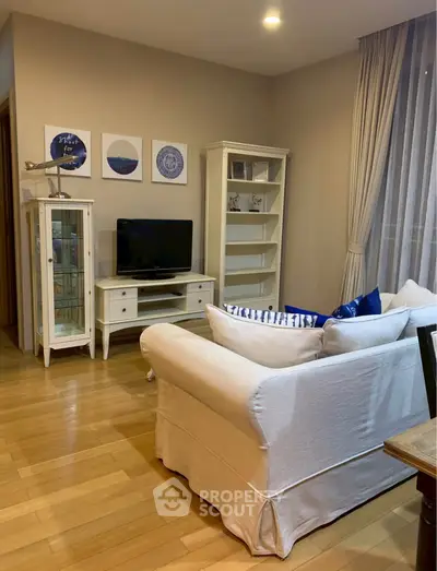 Charming living room with elegant decor and cozy seating area.