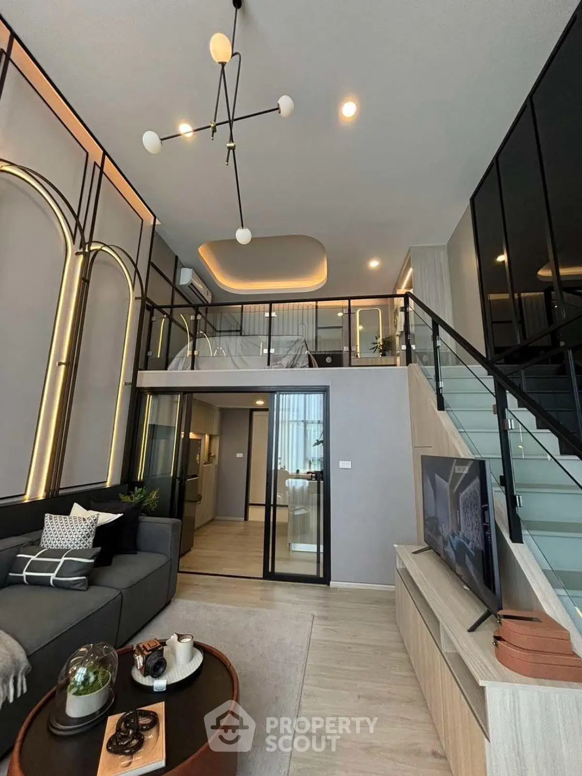 Modern duplex living room with stylish decor and mezzanine level