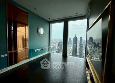 Luxurious high-rise apartment with stunning city view and modern interior design.