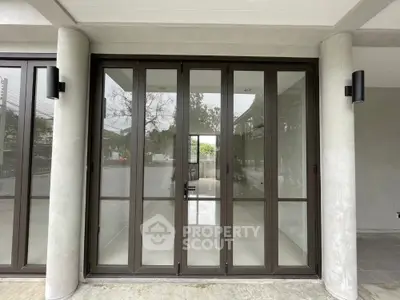 Modern glass doors with sleek design in contemporary building entrance