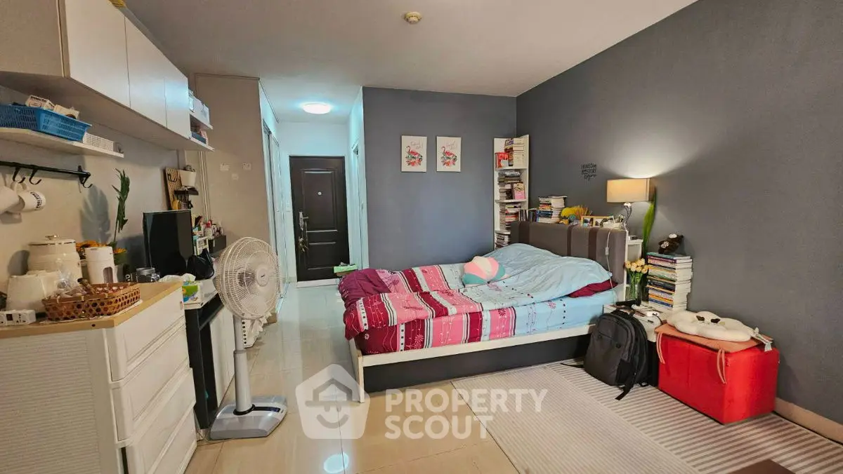 Cozy bedroom with modern decor and ample storage space