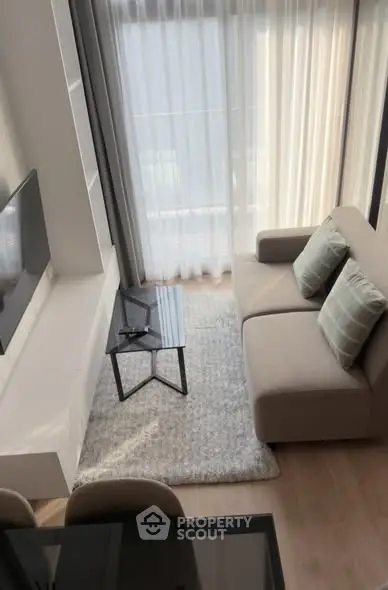 Modern living room with cozy sofa and stylish decor