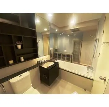 Modern bathroom with sleek design and built-in bathtub