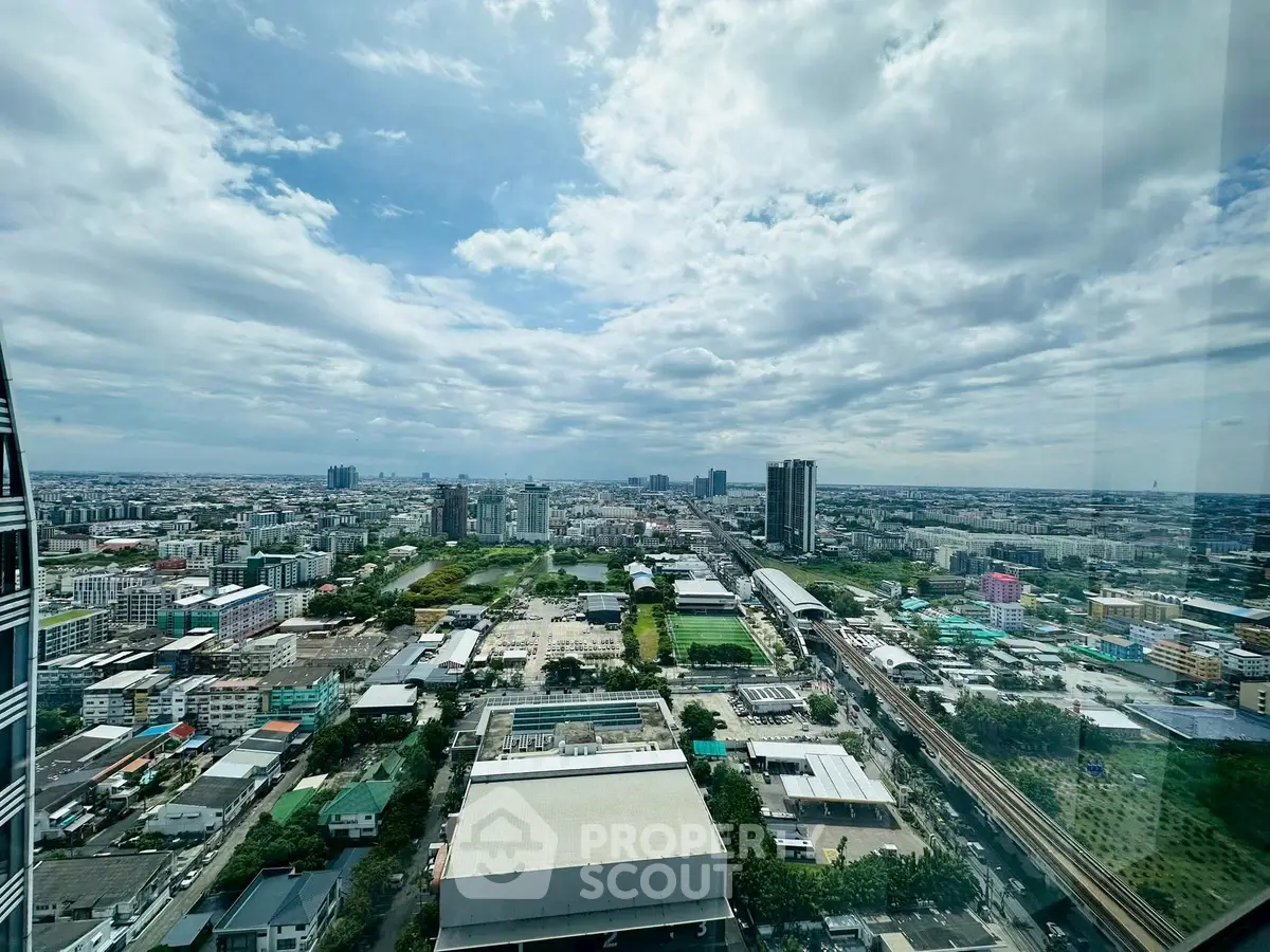 Stunning panoramic city view from a high-rise building, perfect for urban living enthusiasts.