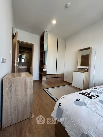 Modern bedroom with wooden furniture and sleek design