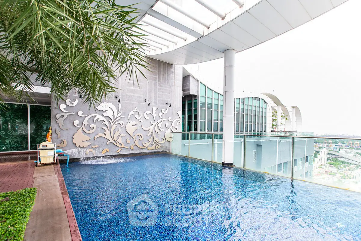 Luxurious rooftop pool with stunning city views and modern architectural design.