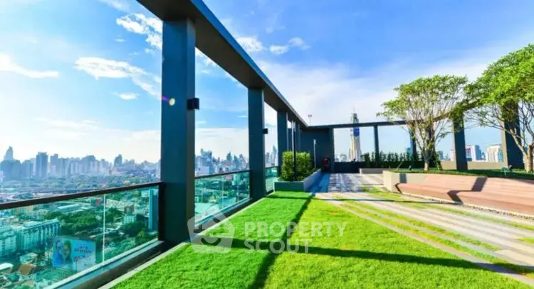 Stunning rooftop garden with panoramic city views and lush greenery.