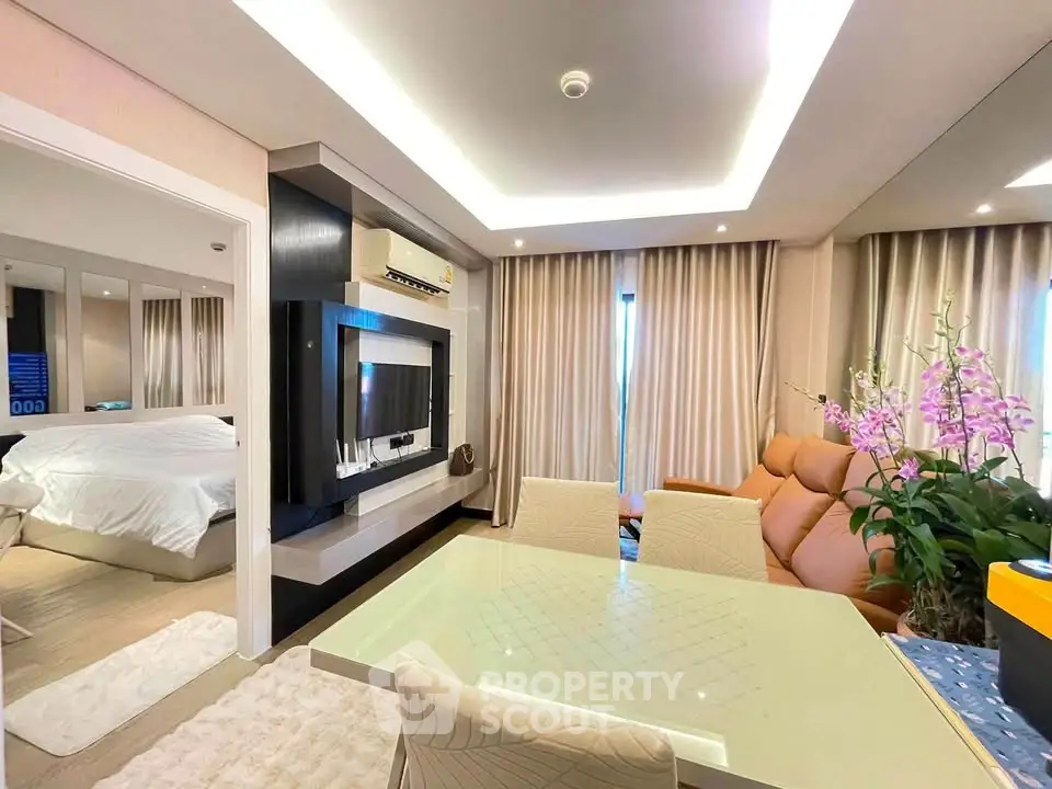 Luxurious modern living room with elegant dining area and cozy bedroom view