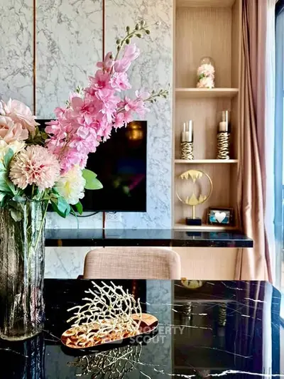 Luxurious living room with elegant decor and marble accents