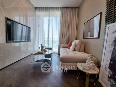 Luxurious living room with modern decor and large window view