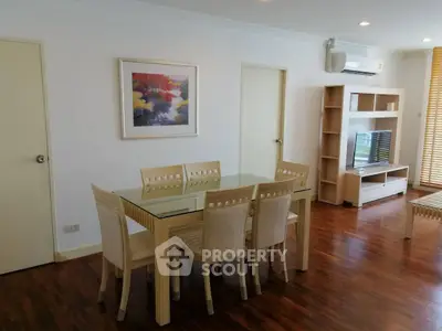 Spacious living room with elegant dining area and modern decor