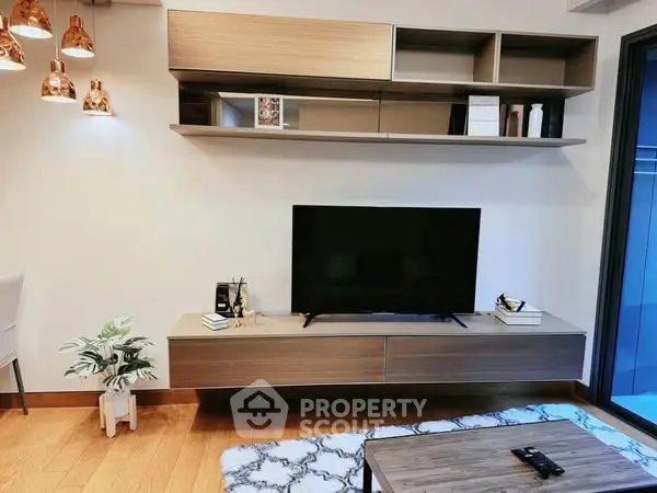 Modern living room with sleek TV unit and stylish decor