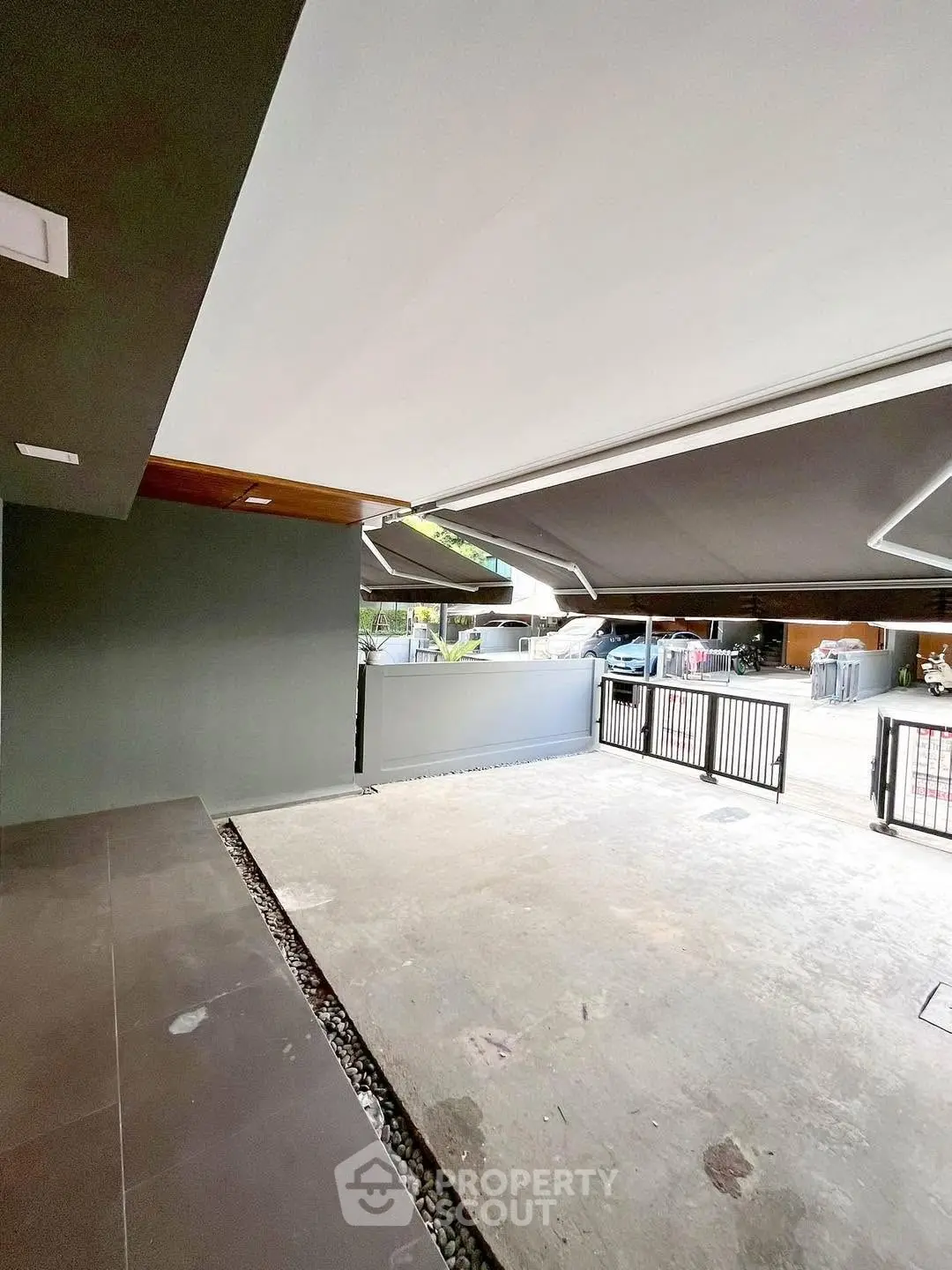 Spacious modern parking area with sleek design and ample space for vehicles.